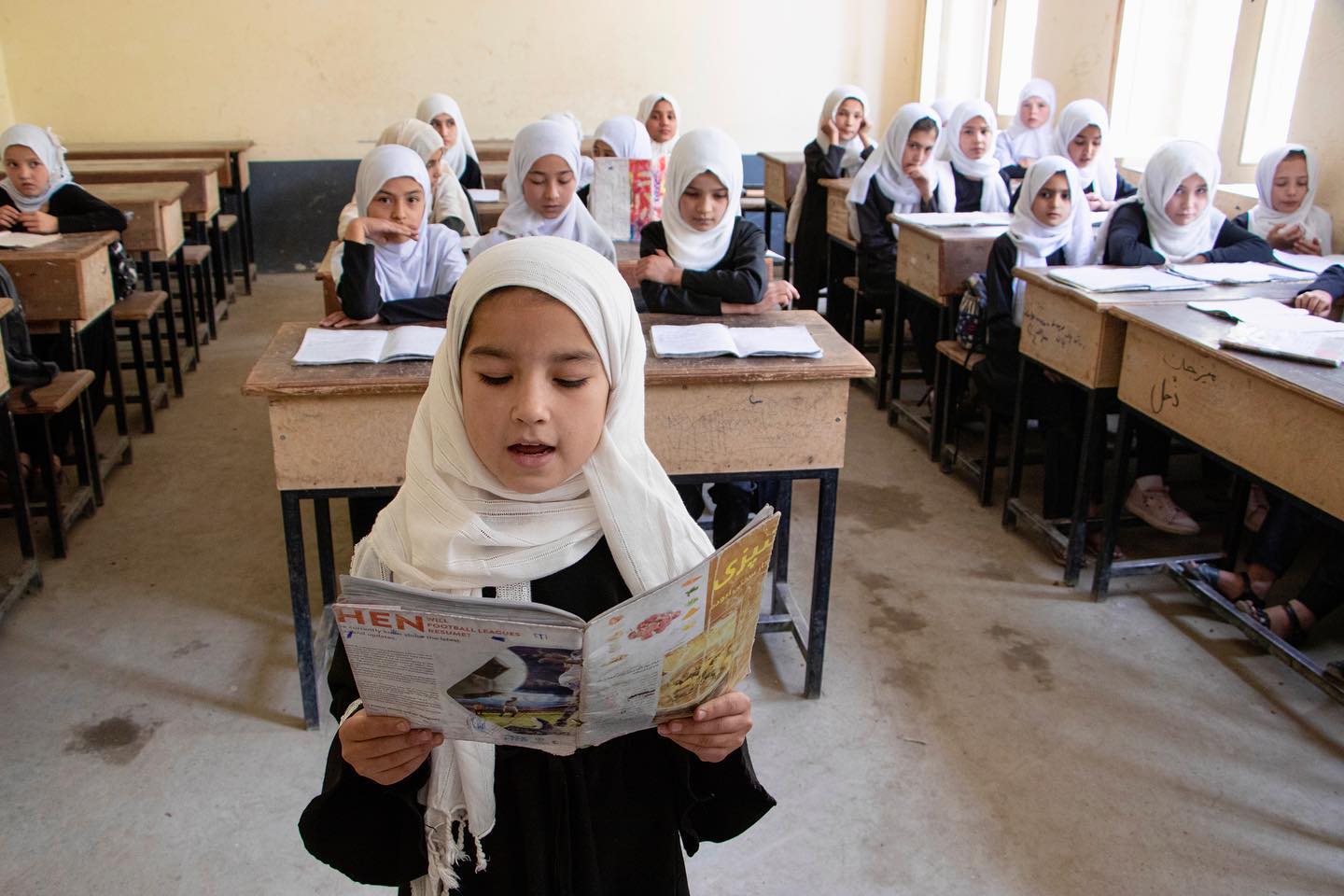 Girls learning in a classroom